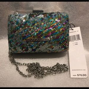 BCBGeneration Hardshell rainbow sequin clutch.